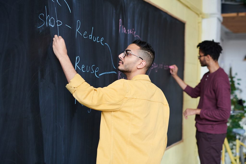 Men Writing On Board 3184645 1024x683